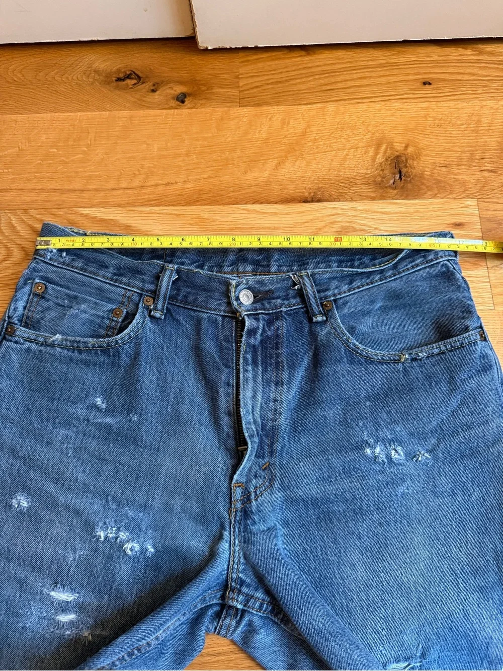 Levi’s Distressed Dark Blue Denim Cutoff Shorts